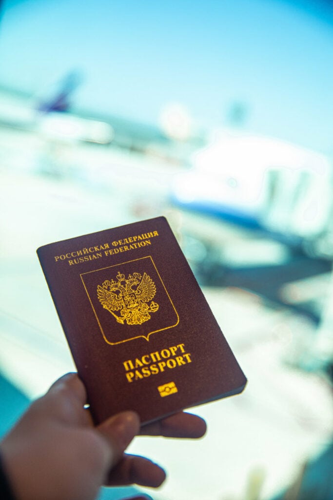 Person Holding a Passport